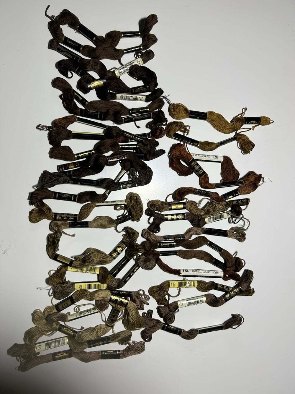 37 Skeins of Embroidery thread in shades of brown DMC , ND